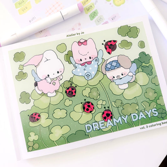 Coloring book titled 'Dreamy Days' with cartoon characters on a green background