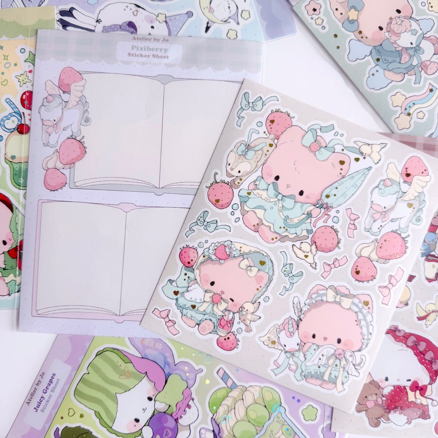 Cute character and decorative strawberry stickers on a taupe background