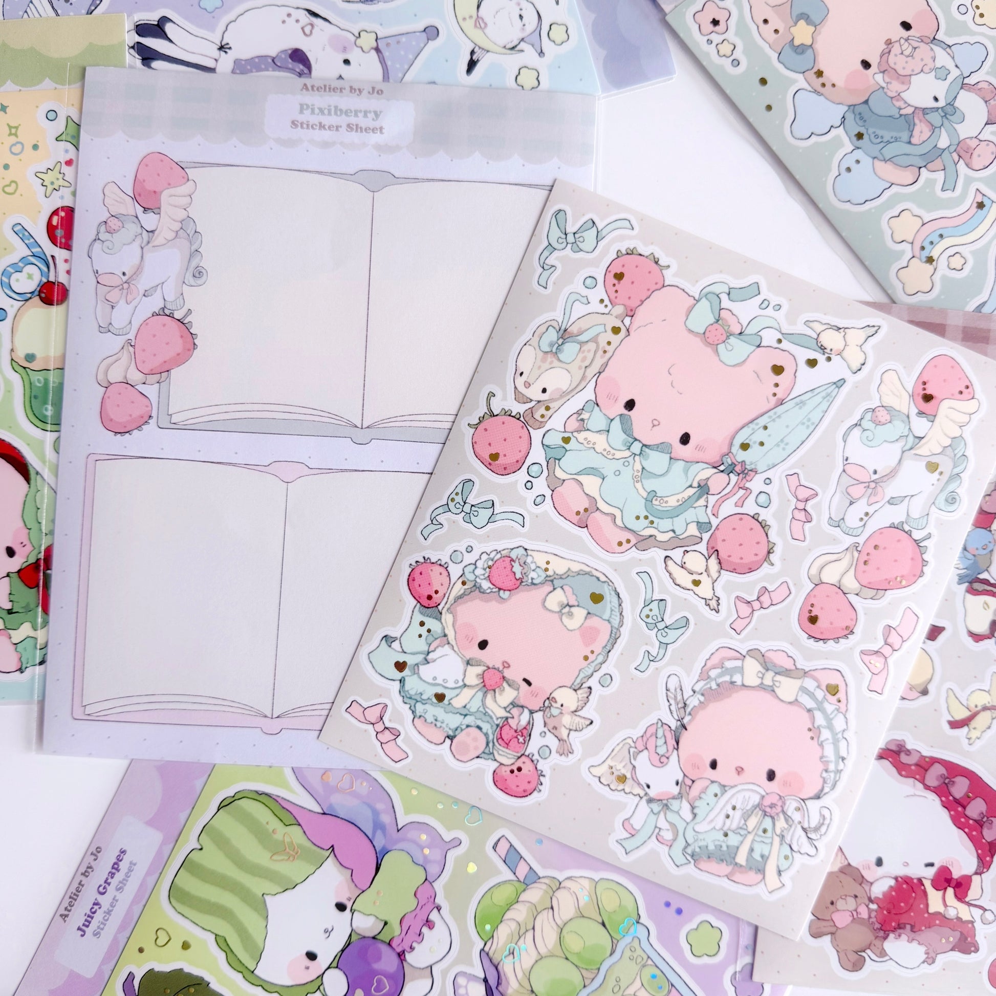 Cute character and decorative strawberry stickers on a taupe background