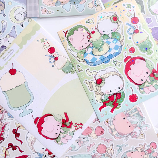 Set of cute cartoon character stickers on a green background