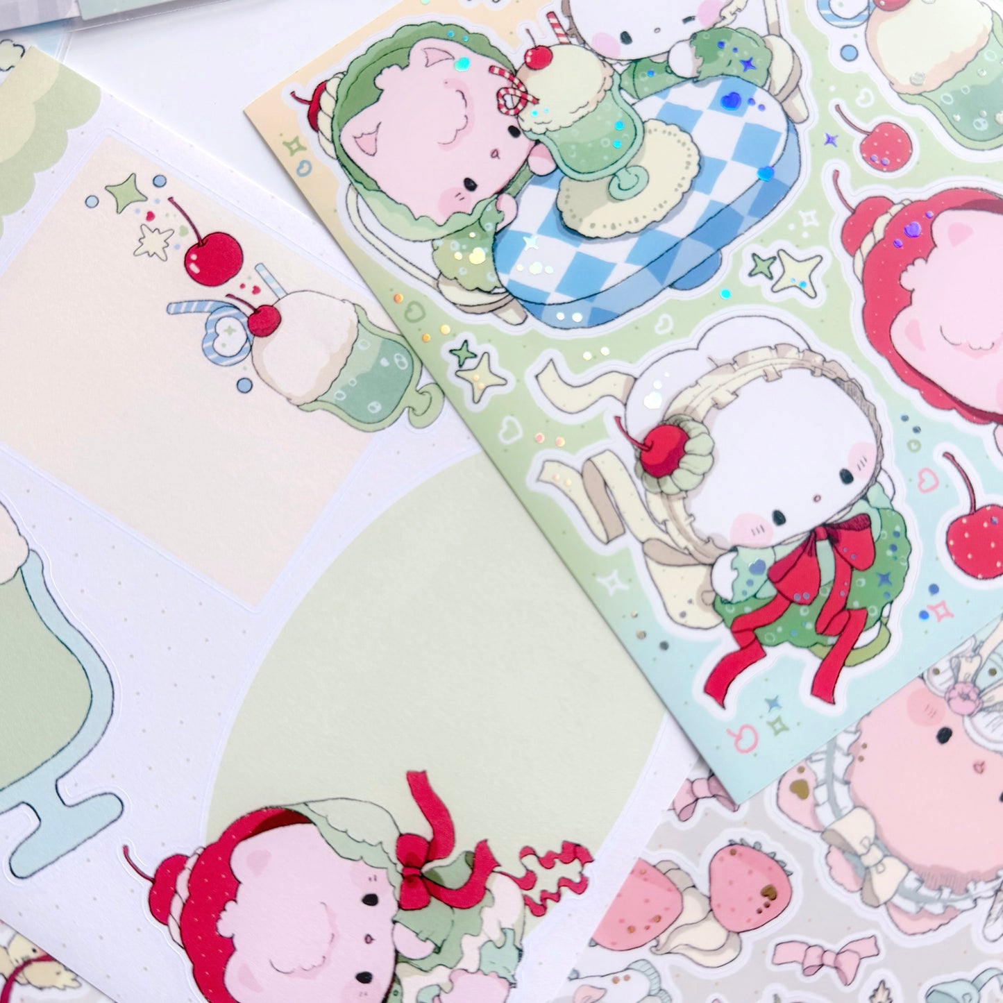 Set of cute cartoon character stickers on a green background