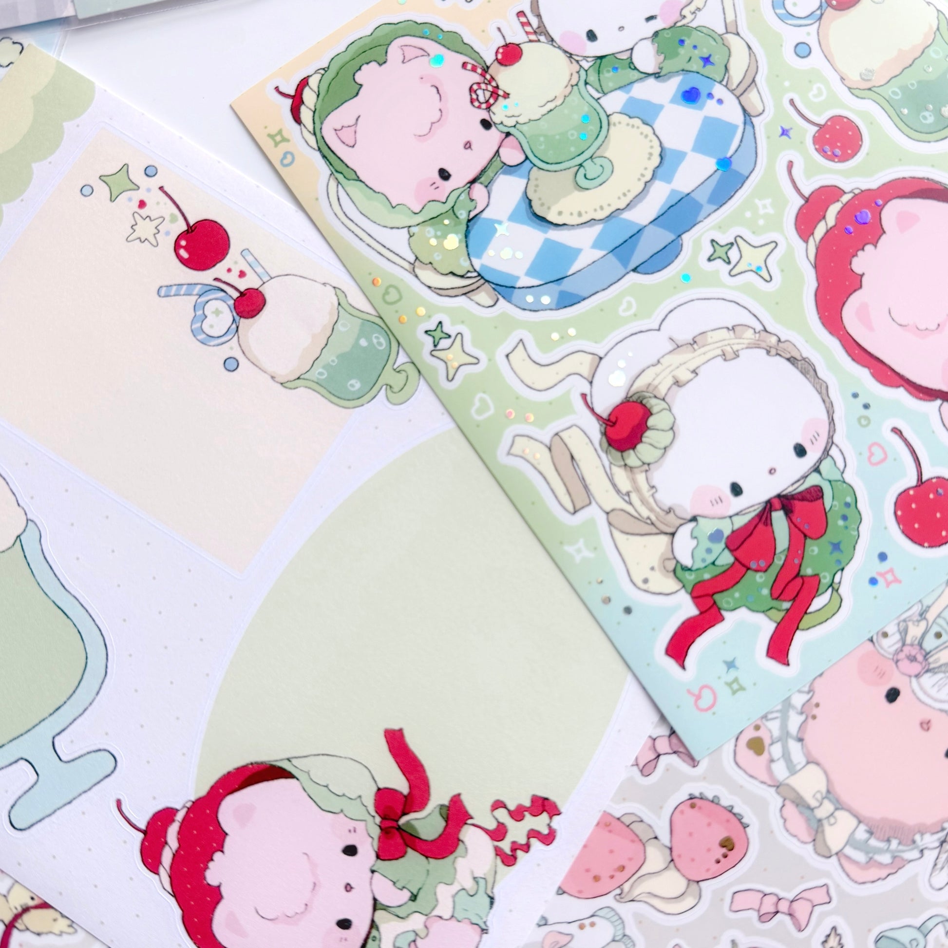 Set of cute cartoon character stickers on a green background